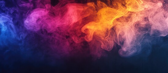 Fototapeta premium Vibrant multicolored smoke effect on a dark backdrop