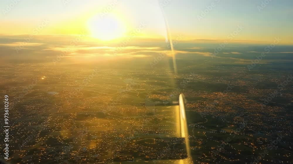 Poster businessman is signing a contract while traveling aboard a private jet, enjoying the golden hour's l