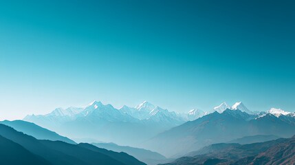 Majestic snow-capped mountain range under clear blue sky, showcasing the breathtaking beauty of towering peaks, pristine wilderness, and serene natural landscape. High resolution, perfect for nature, 