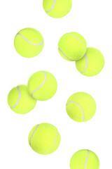 Bright tennis balls in air on white background