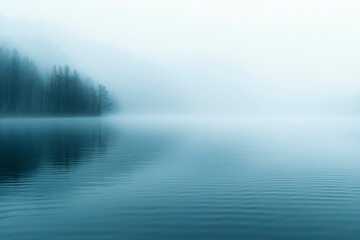 Misty Morning with Silhouetted Trees Reflecting on Calm Lake Water