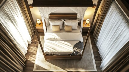 Overhead view of a made bed with white linens, wooden headboard, and a canopy, in a bedroom with curtains and nightstands.