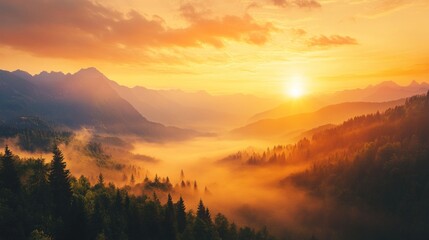 Obraz premium A scenic vista of a mountain range at sunrise with fog and mist rolling through the valley.