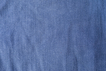 Blue denim fabric macro close-up textured pattern for fashion design