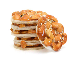 Honey bars with peanuts, sesame and sunflower seeds isolated