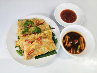 Crispy Egg Martabak with Spicy Sauce and Pickled Vegetables 