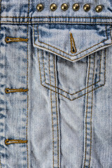Close-up of blue denim jeans texture with visible pockets, showcasing casual fashion detail