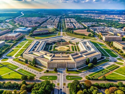 Aerial view of the sprawling Pentagon building in Washington D.C., a iconic five-sided architecture surrounded by lush