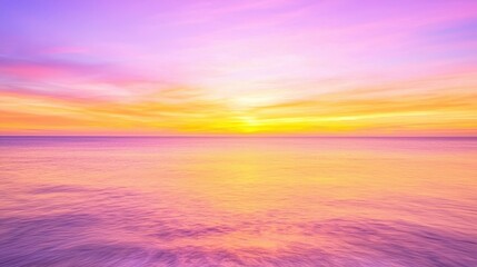 Pink and Orange Sunset Over Calm Ocean Water