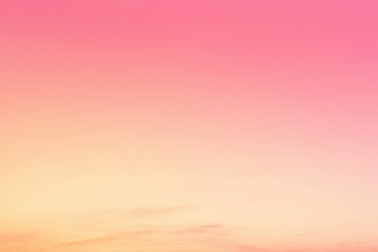 Pink and orange sunset gradient background fading to yellow