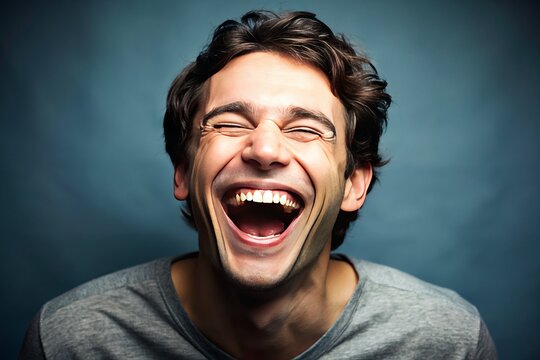 A joyful individual is overcome with uncontrollable laughter, eyes closed, and mouth open in an exaggerated expression