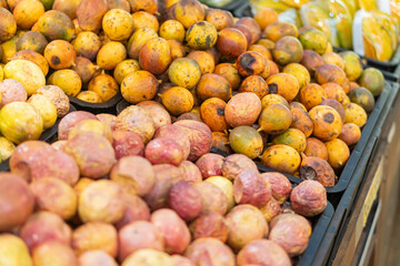 Vibrant Tropical Fruits Display in Market