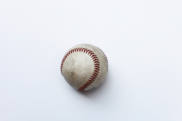 An old baseball isolated on white background