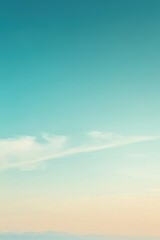 Obraz premium Pastel colors sky with clouds background creating peaceful atmosphere