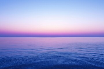 Obraz premium Calm ocean reflecting purple sunset sky gradient