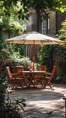 London garden in summer with patio, wooden garden furniture and a parasol or sun umbrella