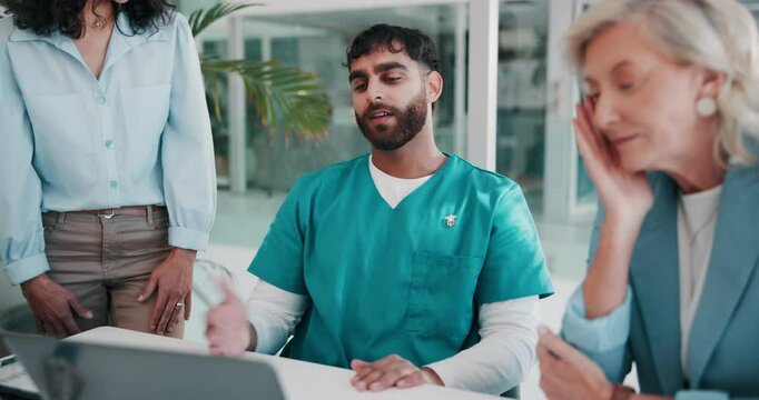 Medical, group and disappointed with laptop at hospital for application disapproval, feedback results and bad news. Doctor, people and meeting with digital for healthcare report, review and schedule