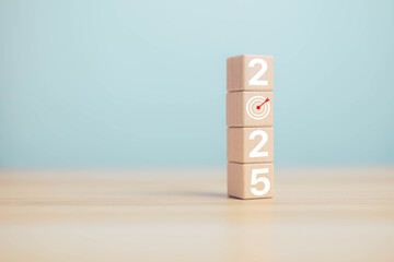 2025 Happy New Year with arrange the wood block in vertical. Goals in future, Plan, Idea work