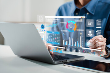 Financial audit. financial management. Business account tax report , Auditor use laptop for...