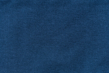 Blue jeans apparel fabric background texture, cloth garment concept, close up view.