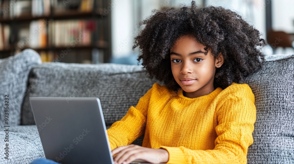 Aufkleber high school student sitting on a couch with a laptop attending an online lecture the screen shows a 