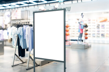 Mockup Blank vertical poster at Fashions Store in shopping mall