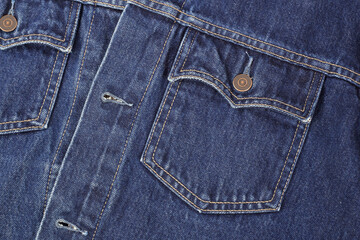 Fototapeta premium Clothes, shoes and accessories - Closeup top view fragment dark blue jeans jacket
