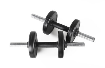 Fototapeta premium Sport and fitness - Two dumbbells with two weights in white