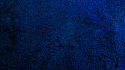 Dark blue grungy backdrop with golden splatters. Abstract dark blue concrete texture background.