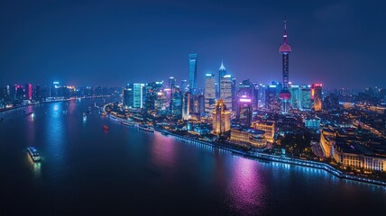 Fototapeta premium Stunning nighttime view of a vibrant city skyline illuminated with colorful lights reflecting on the water.