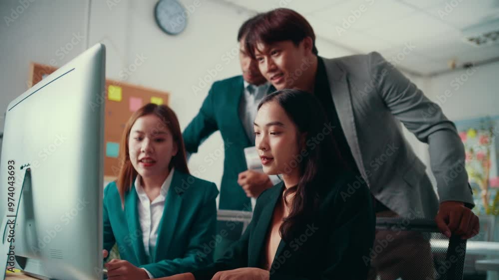 Poster team of young professionals is engaged in a lively discussion around a computer screen, analyzing da