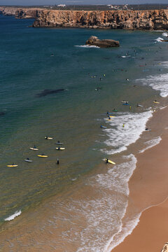 Ocean waves, surfing in Praia do Tonel in Sagres, Algarve, Portugal.