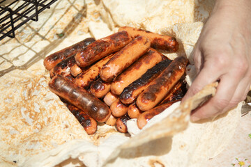 Sausage on the street. Food on the fire.