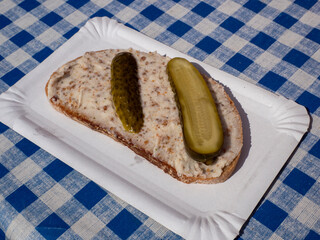Bread with bacon fat and pickled cucumber from the Spreewald