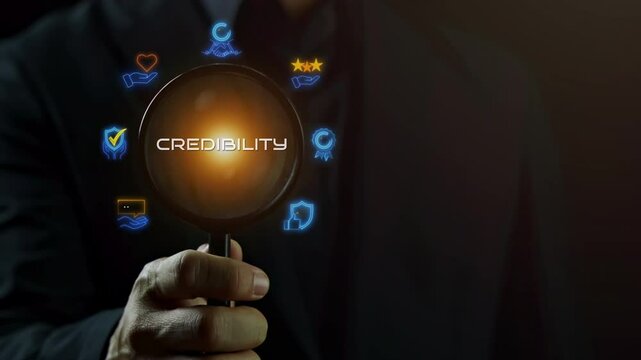Businessman showing glowing neon line banner of credibility concept with icons of integrity, trust, reliable, authentic, commitment, regard and reputation on virtual screen.