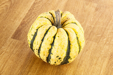 Ripe raw fresh decorative pumpkin