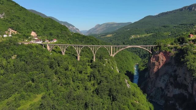 Aerial view on Djurdjevica arch bridge over the Tara River in northern Montenegro, 4k