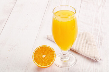 Sweet fresh orange juice in the glass