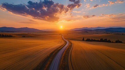 Fototapeta premium Sunset Over Winding Road