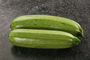 Raw green ripe zucchini vegetable