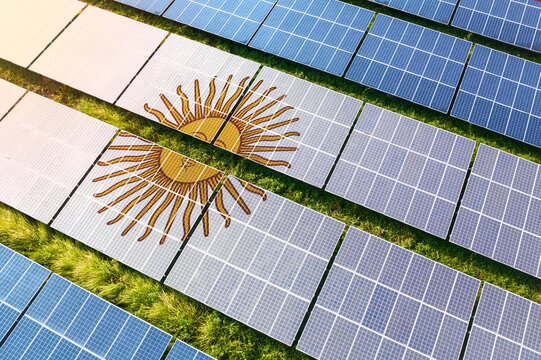 Solar farm superimposed with flag of Argentina. Symbolizing solar power and panel demand, renewable energy industry, government policy, and sustainability initiatives in the country. - Powered by Adobe