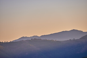 Nature, landscape and sunrise on mountain in Spain for environment, travel and scenic destination. Natural background, wallpaper and hills, sky and sunshine in countryside, outdoors and terrain