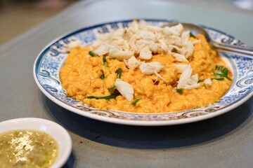 A plate of rice with stir-fried crab curry and nam jim jaew (seafood dipping sauce) at Chula 50 Kitchen in Silom, Bang Rak - Bangkok Thailand