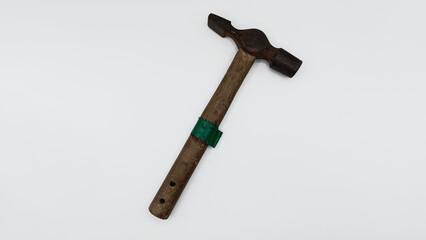 Vintage Hammer with Rusty Head and Wooden Handle Isolated White Background.