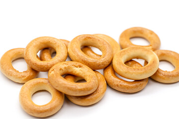 chaotically scattered bagels on top of each other isolated to decorate the design background