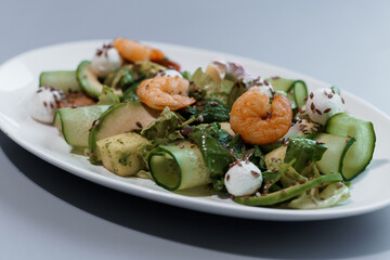 Gourmet Shrimp and Zucchini Ribbon Salad with Fresh Greens and Goat Cheese Garnish