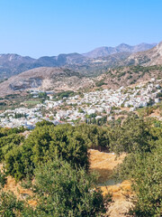 Obraz premium Mountain view to a white Greek village in Naxos Island, Cyclades, Greece