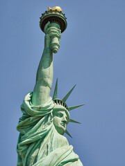 Fototapeta premium The Statue of Liberty Enlightening the World. Usa National Monument. Recognized as a universal symbol of freedom and democracy. National Park Service.