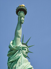 Fototapeta premium The Statue of Liberty Enlightening the World. Usa National Monument. Recognized as a universal symbol of freedom and democracy. National Park Service.