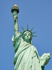 Fototapeta premium The Statue of Liberty Enlightening the World. Usa National Monument. Recognized as a universal symbol of freedom and democracy. National Park Service.